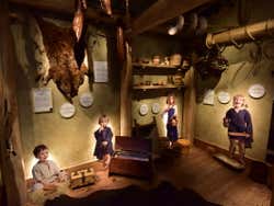 An exhibition of Vikings with children seen